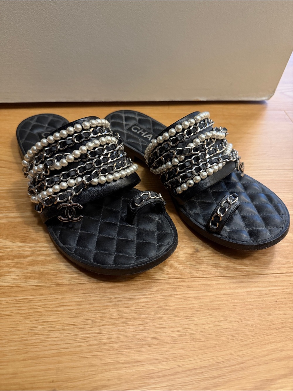 CHANEL Black Quilted Pearl & Chain Slide Sandals with CC Charm